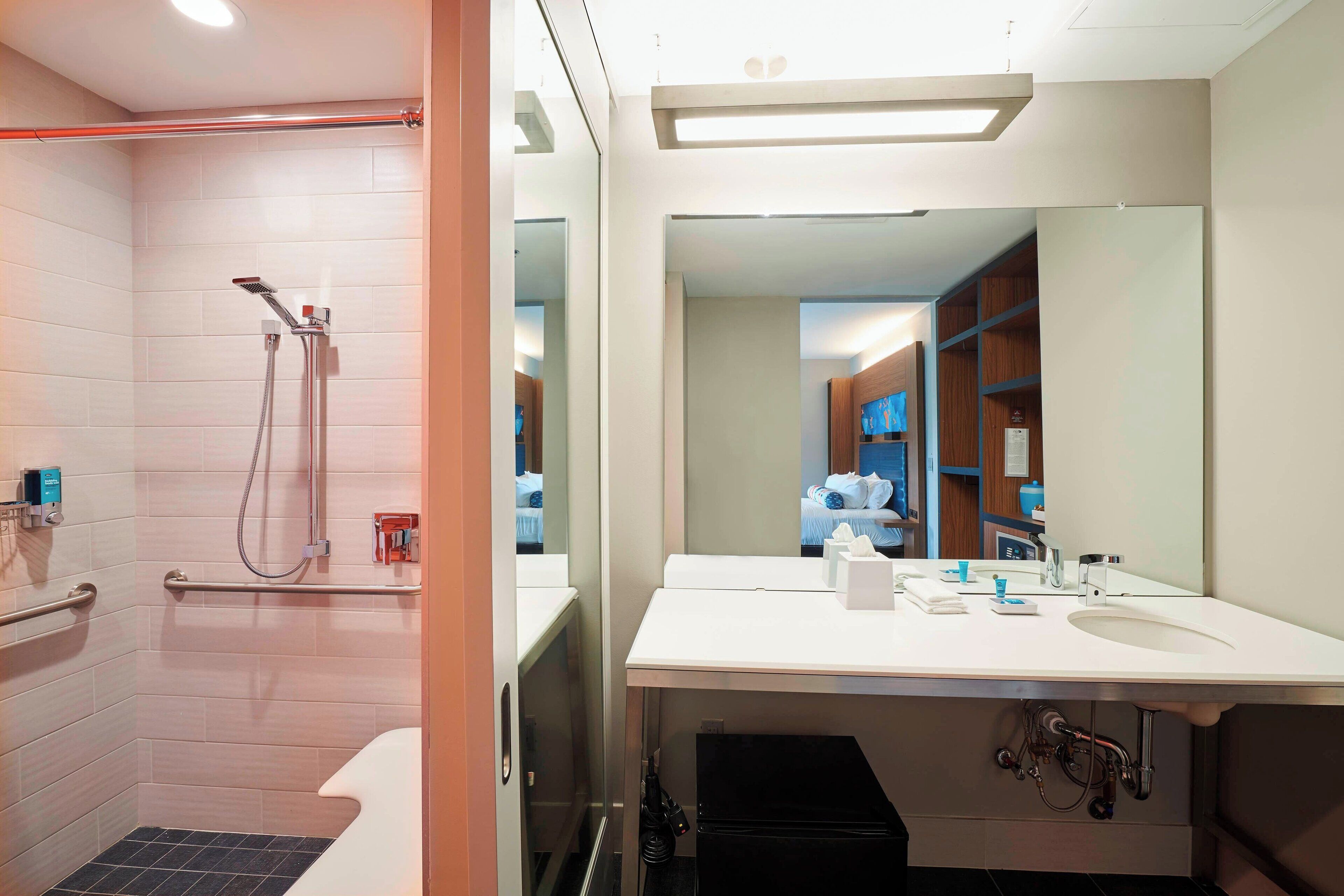 shower, free toiletries, hair dryer, towels