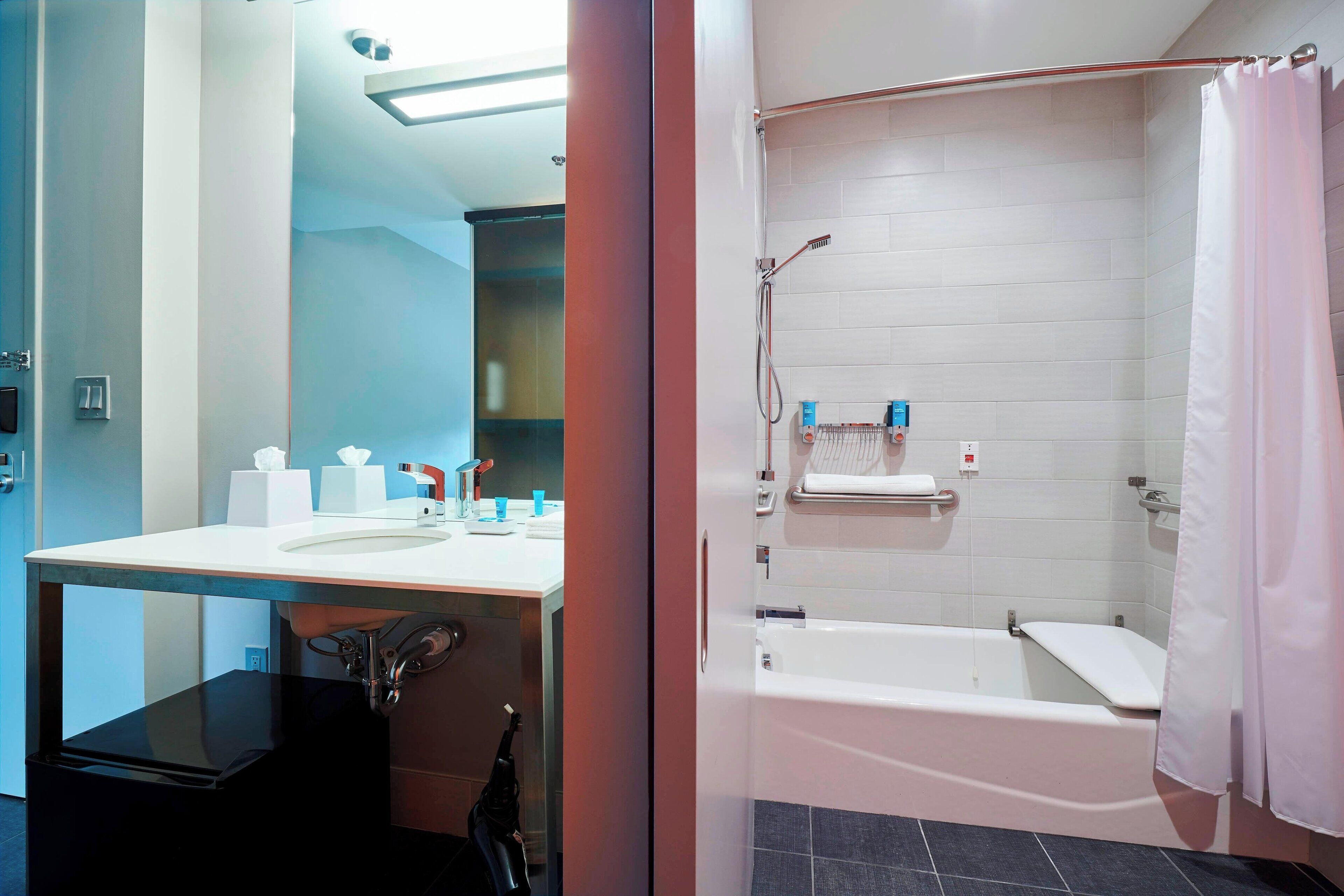 shower, free toiletries, hair dryer, towels