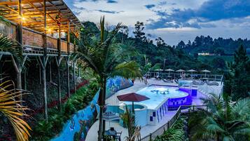 Outdoor pool, open 9:00 AM to 8:00 PM, pool umbrellas, pool loungers