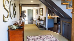 A modern interior with a staircase, a dining area, and a kitchen. - No hidden cleaning charges.  Huge 3bd/3ba apartment with tons of waterviews. (Belfast)