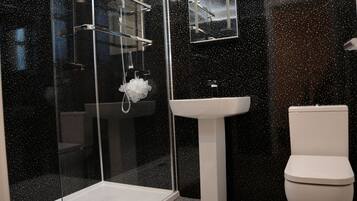 Hair dryer, towels, soap, shampoo
