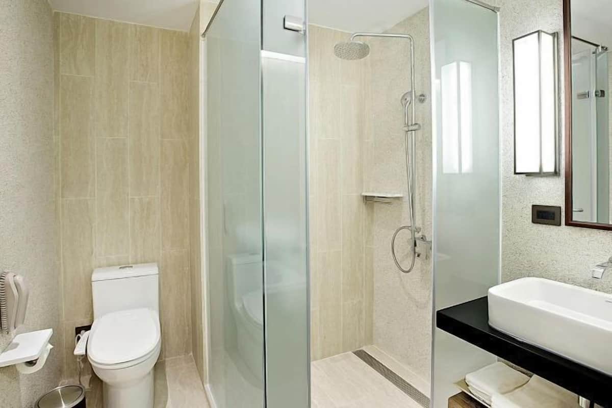 Bathroom | Designer toiletries, hair dryer, bathrobes, slippers