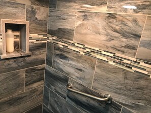 Combined shower/tub, hair dryer, towels, soap