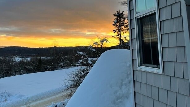 A house with snow-covered ground and icicles hanging from the roof. - 3BR/2.5BA Eden Ridge, Great Location for Bethel & Sunday River (Bethel)