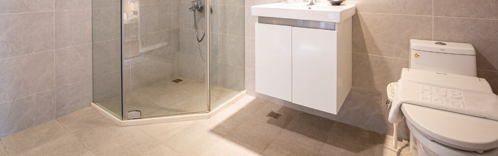 hair dryer, slippers, towels, shampoo