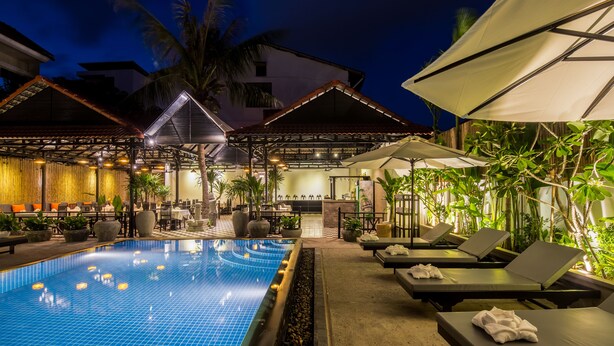 Outdoor pool, open 8:00 AM to 9:00 PM, pool umbrellas, pool loungers - The Cyclo Siem Reap Hotel (Siem Reap)