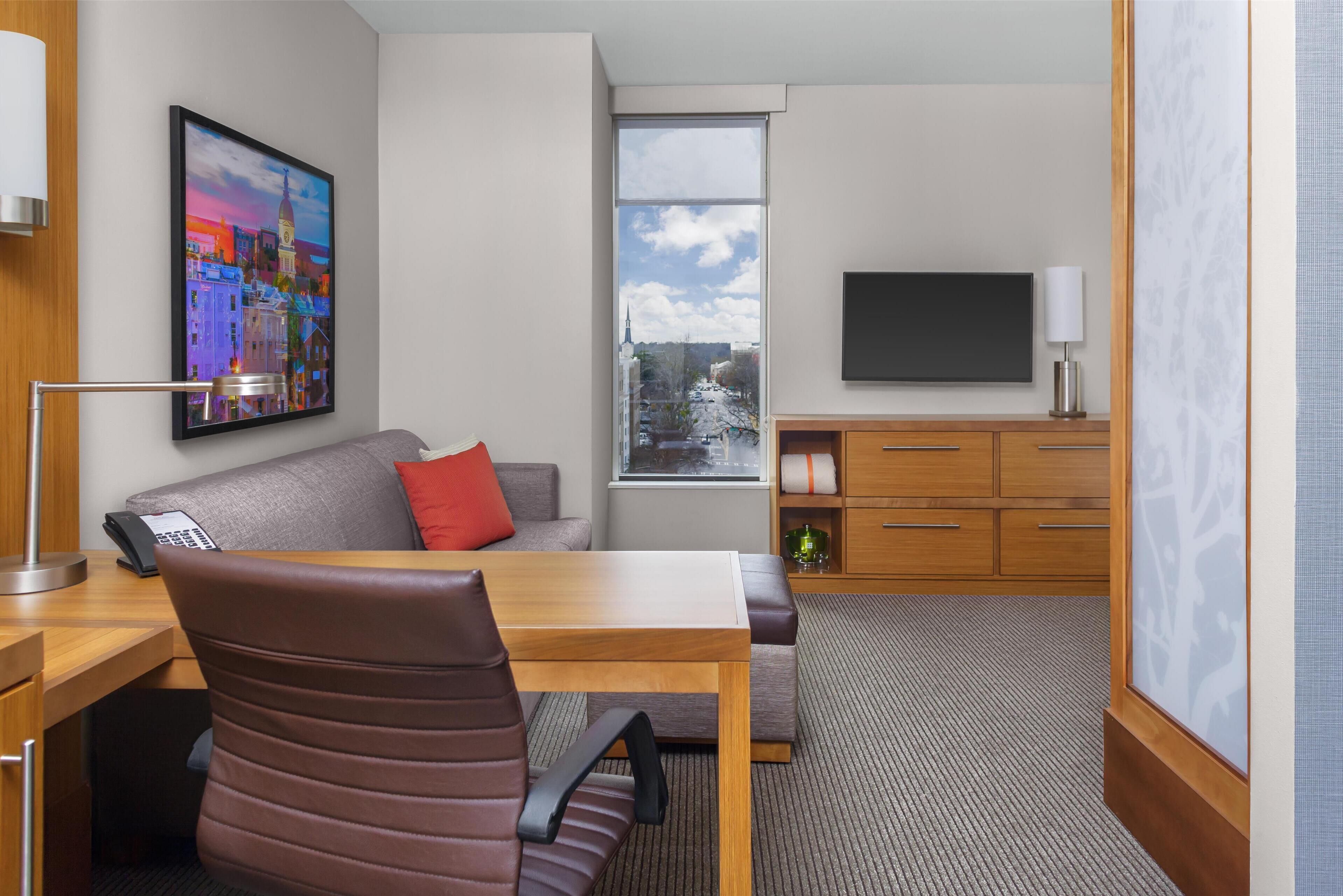 room, 1 king bed with sofa bed | premium bedding, blackout curtains, iron/ironing board