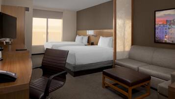 Premium bedding, blackout curtains, iron/ironing board
