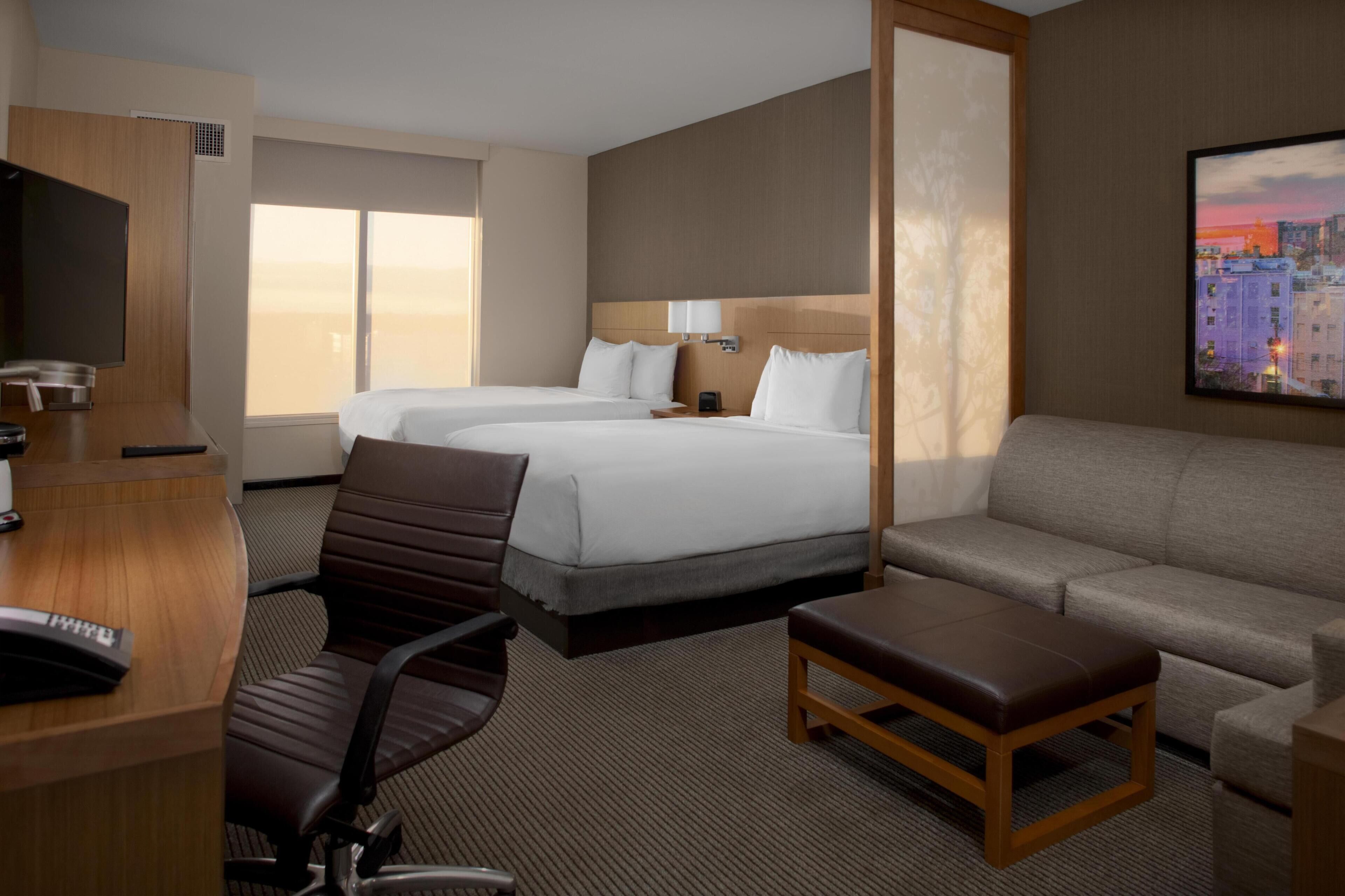 Premium bedding, blackout drapes, iron/ironing board