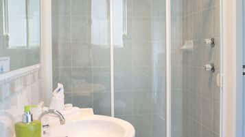 Shower, free toiletries, hair dryer, towels