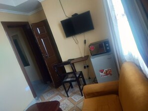 Deluxe Room, 1 King Bed, Lake View | Premium bedding, desk, laptop workspace, iron/ironing board -  Riversand hotel with Lake views,Accra street,Kisumu,Kenya (Kisumu)