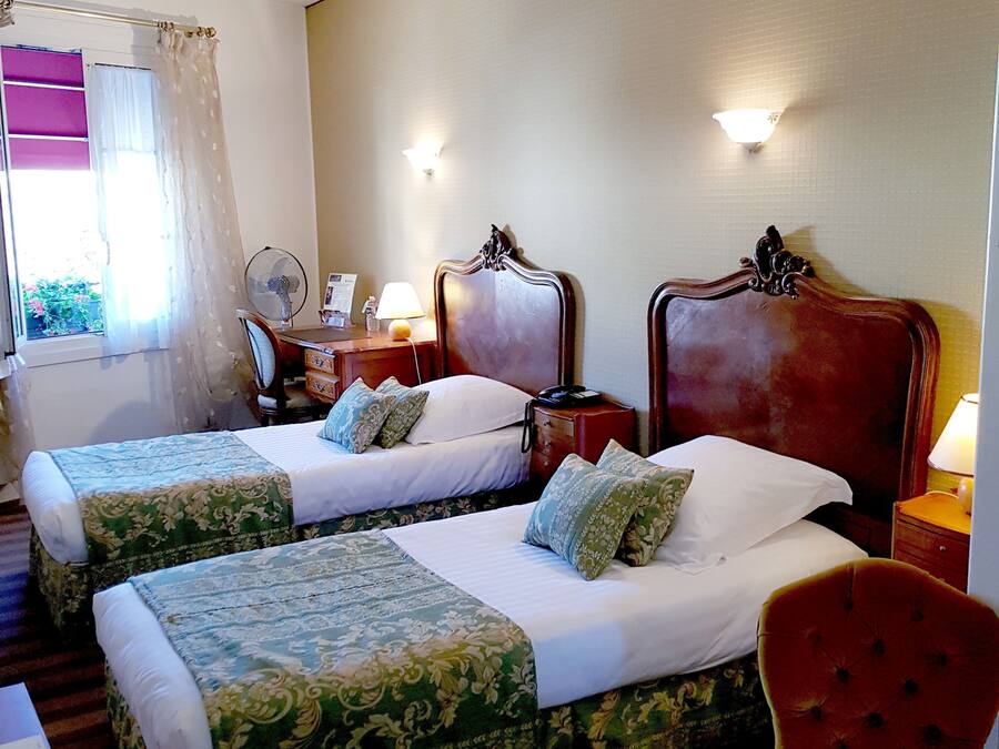 Standard Twin Room | Minibar, desk, blackout drapes, rollaway beds