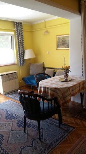 City Apartment, Balcony, Ground Floor | Living area | TV