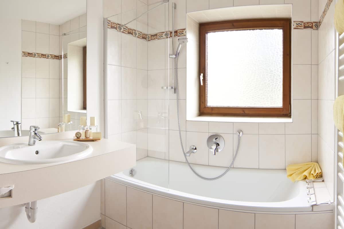 suite, 1 bedroom, balcony | bathroom | free toiletries, hair dryer, bathrobes, slippers