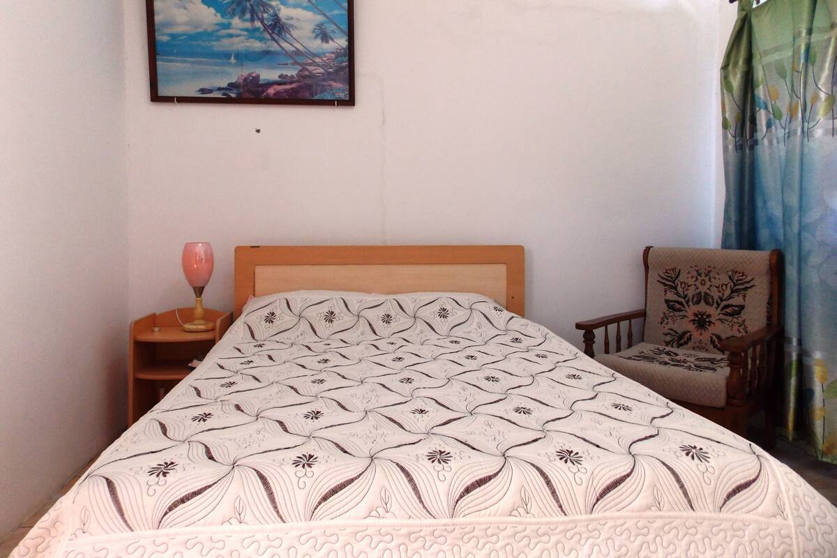 Family Room | Desk, blackout drapes, iron/ironing board, free cribs/infant beds