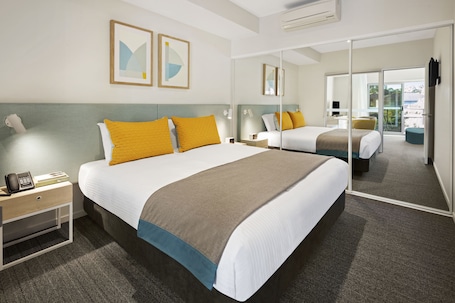 2 bedrooms, premium bedding, in-room safe, desk
