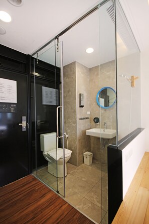 Shower, eco-friendly toiletries, hair dryer, towels