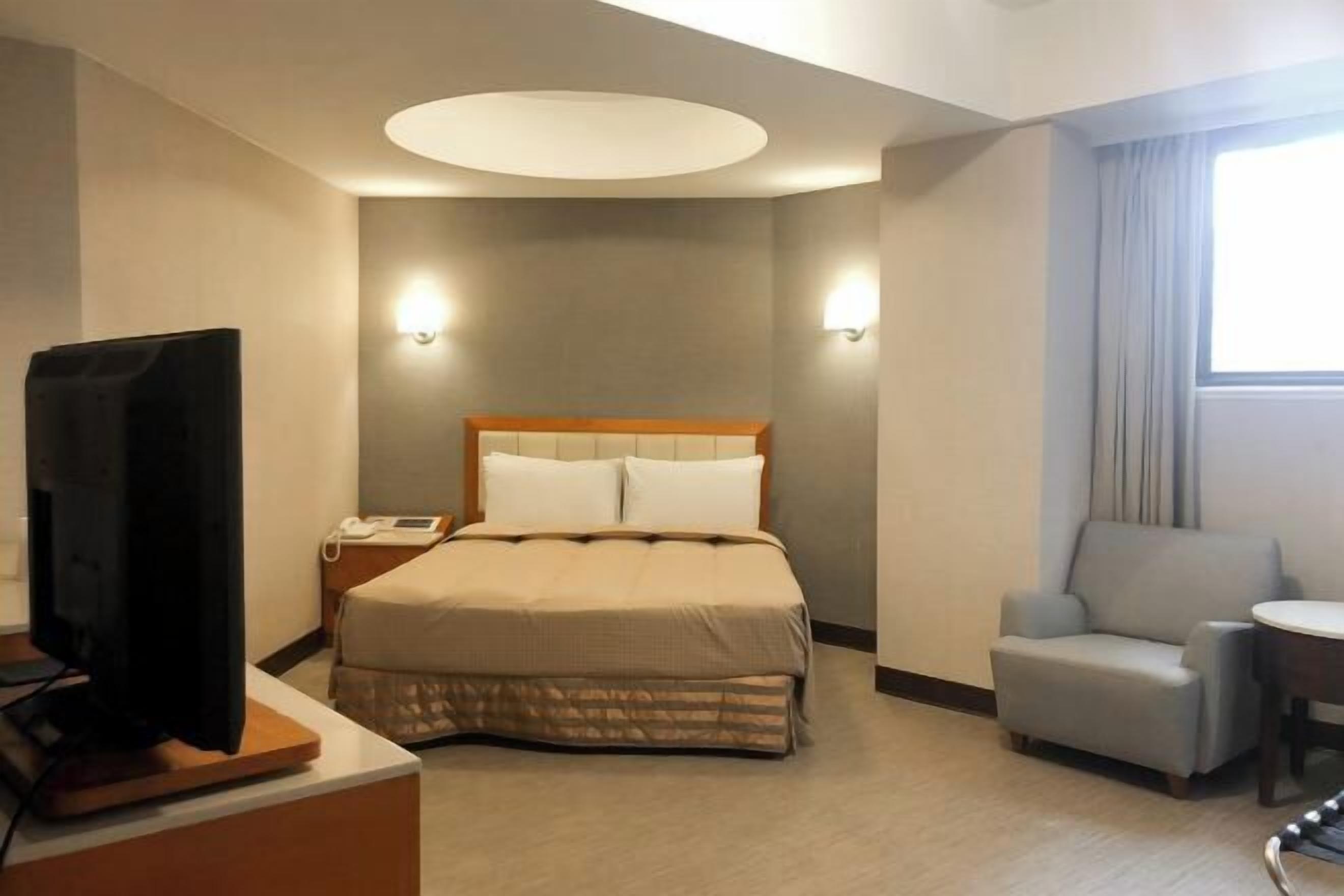 Desk, laptop workspace, blackout drapes, soundproofing