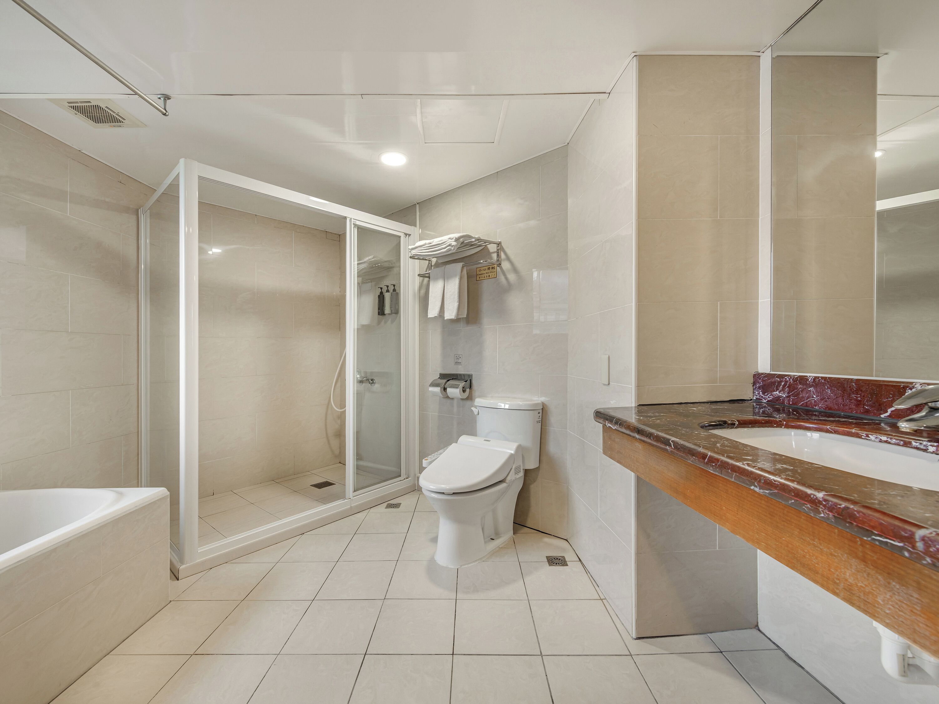 Deluxe Double Room | Bathroom | Separate tub and shower, rainfall showerhead, hair dryer, towels