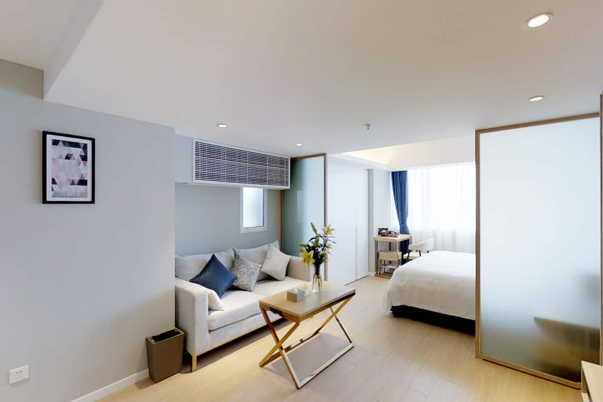 Habitación Premier | Ropa de cama de alta calidad y caja de seguridad en la habitación