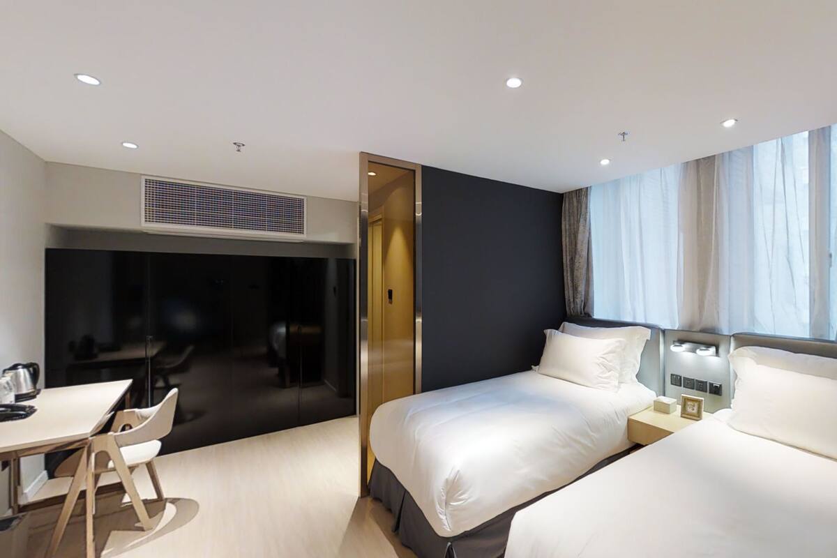 Habitación de lujo con 1 cama matrimonial o 2 individuales, 2 camas individuales | Ropa de cama de alta calidad y caja de seguridad en la habitación