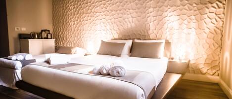 Habitación Deluxe | Ropa de cama de alta calidad, edredón y camas con efecto memoria