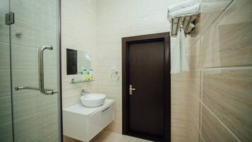 Standard Double Room | Bathroom | Shower, free toiletries, hair dryer, bathrobes