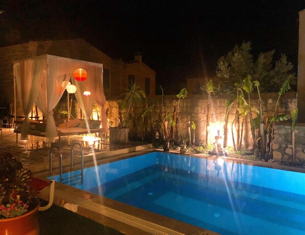 Seasonal outdoor pool, pool umbrellas, pool loungers