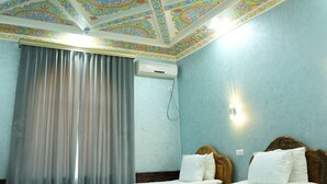 Standard Triple Room | Living area - Shaherezada Boutique Hotel (Khiva)