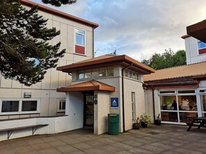 A building with a sign for 'Hostelling Scotland' indicating a hostel accommodation. - Inverness Youth Hostel (Inverness)