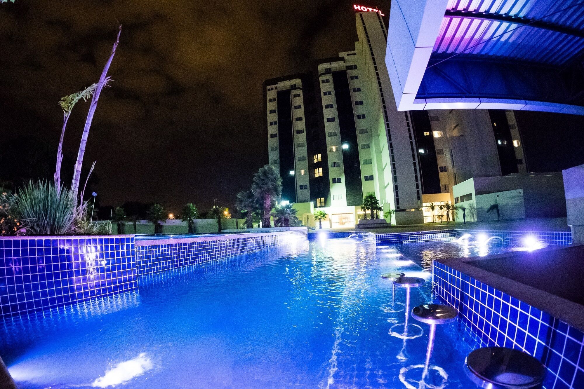 indoor pool, outdoor pool, pool loungers