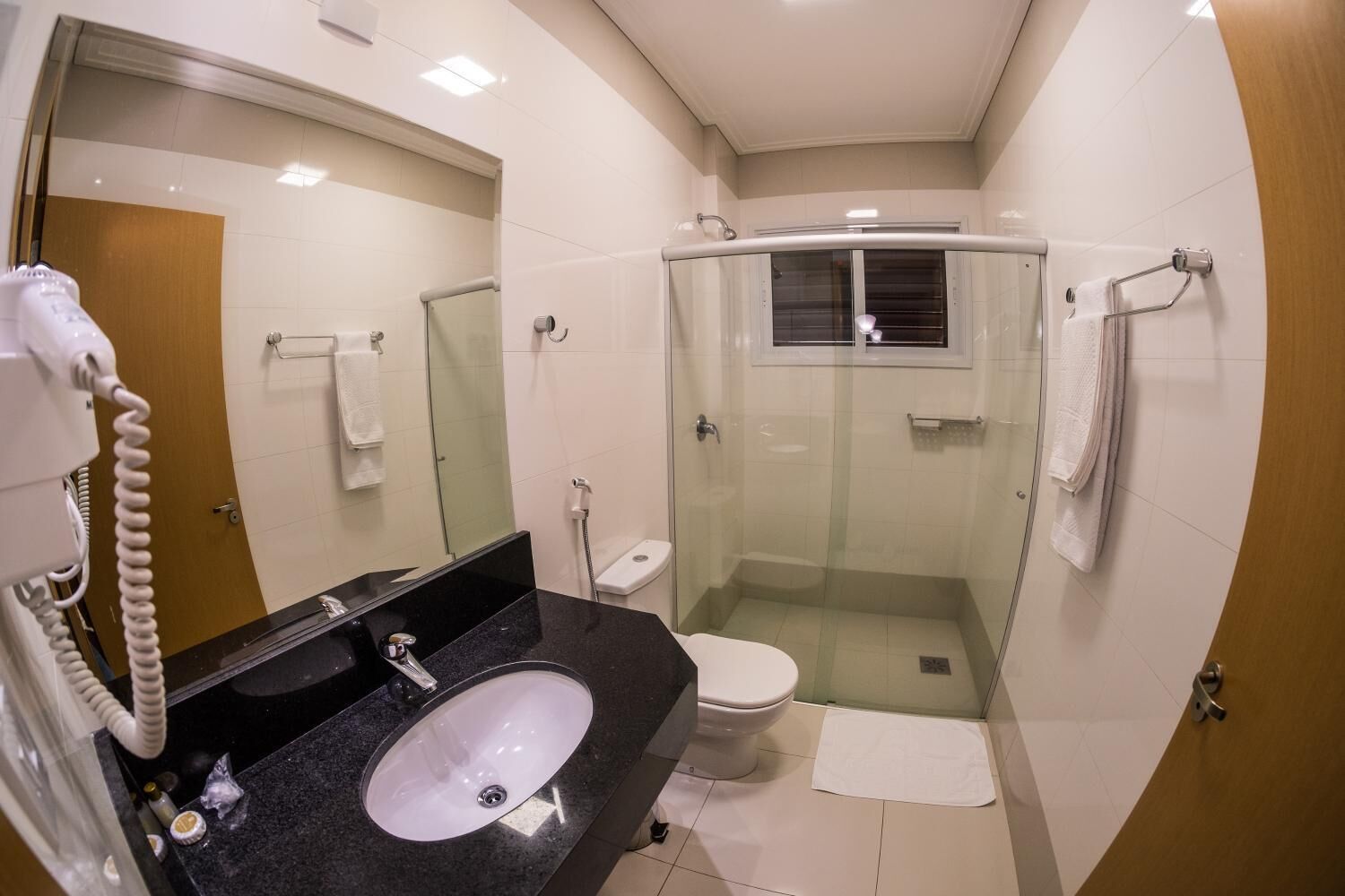 shower, free toiletries, hair dryer, towels