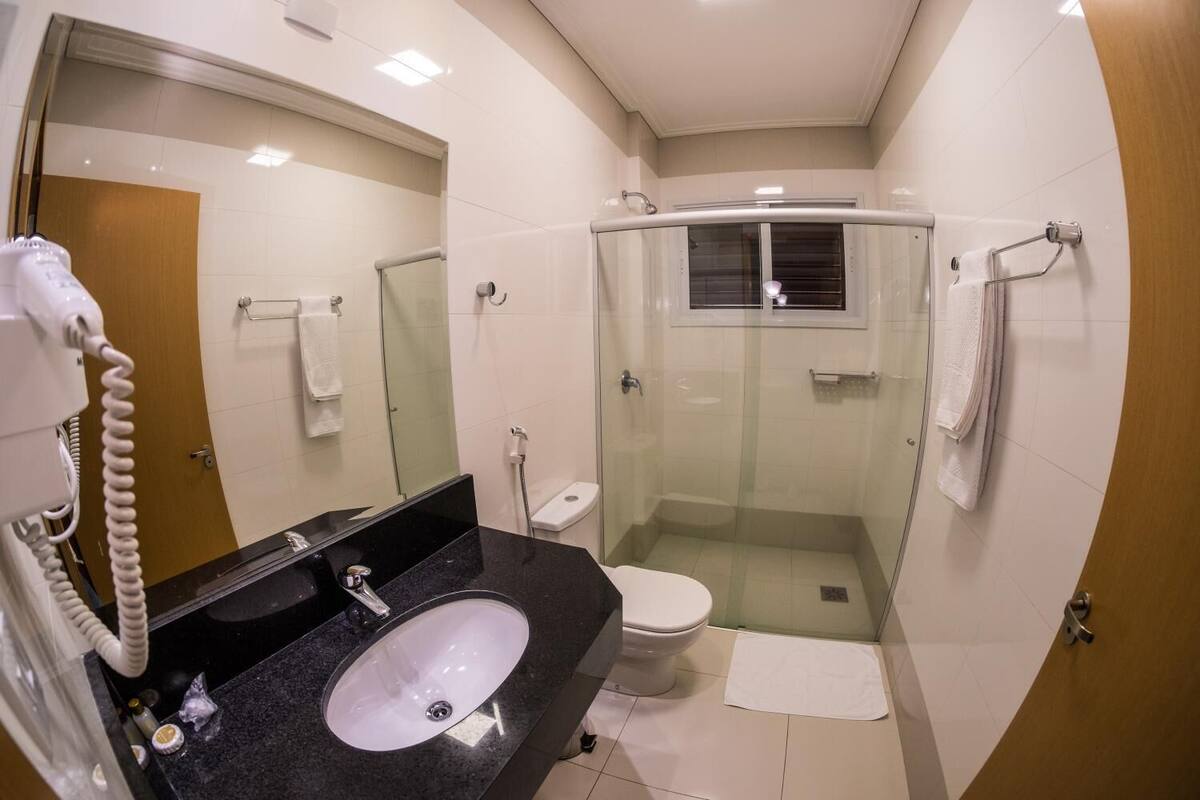 shower, free toiletries, hair dryer, towels