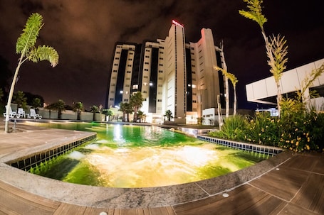 Indoor pool, outdoor pool, sun loungers. HD Park Hotel