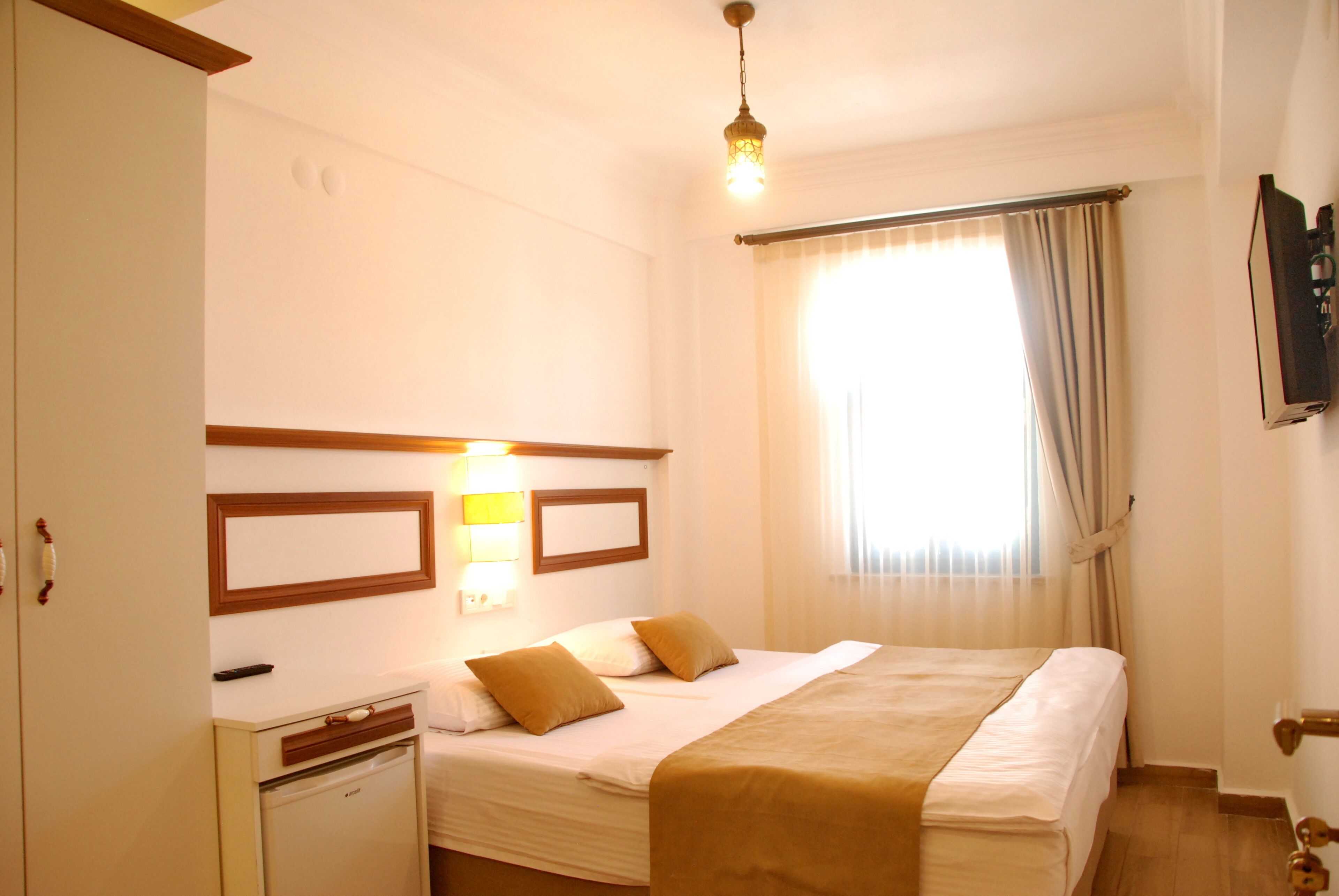 economy room, 1 double bed, non smoking | 1 bedroom, minibar, blackout curtains, free wifi