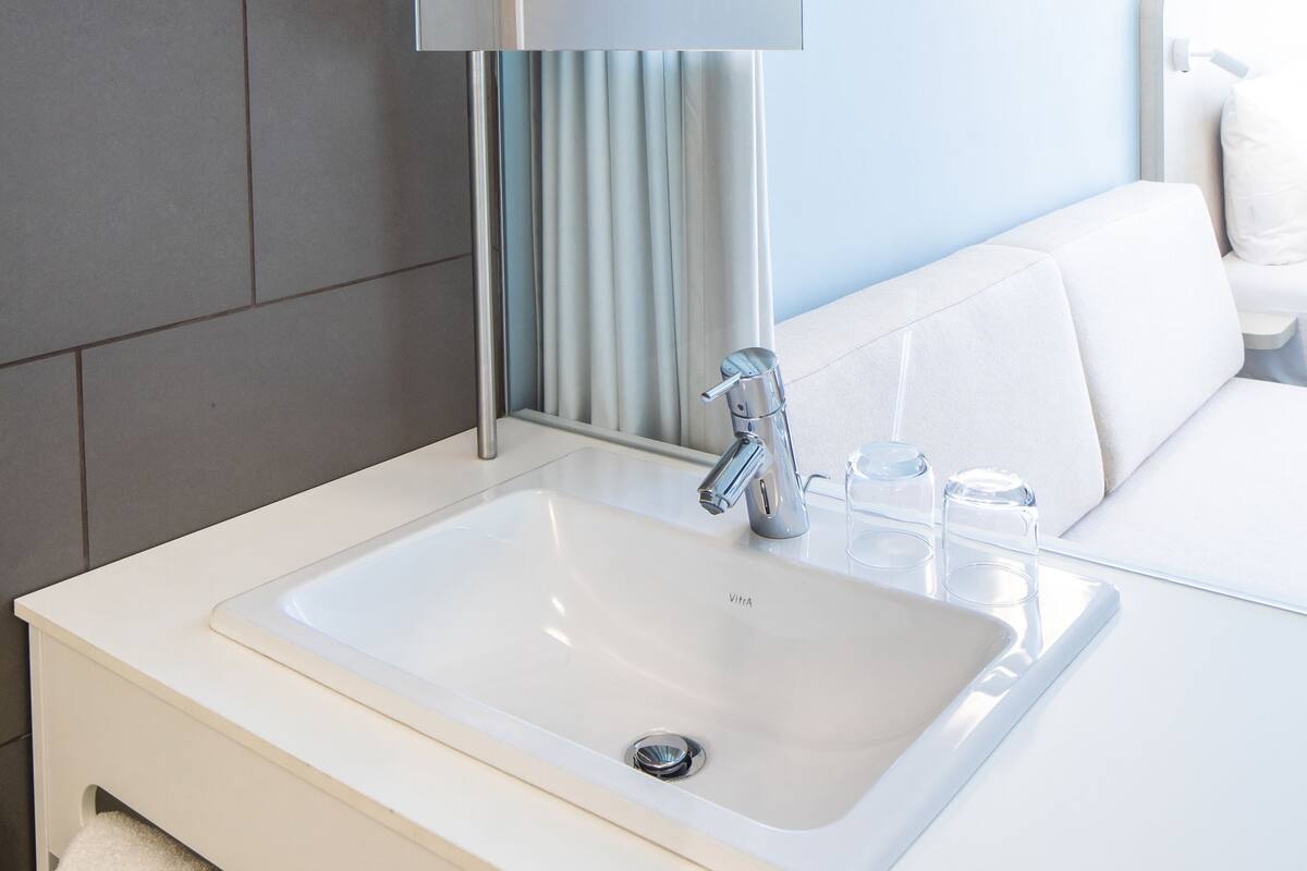 shower, hair dryer, bathrobes, towels