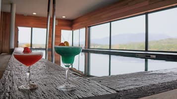 Indoor pool, open 8:00 AM to 8:30 PM, pool loungers