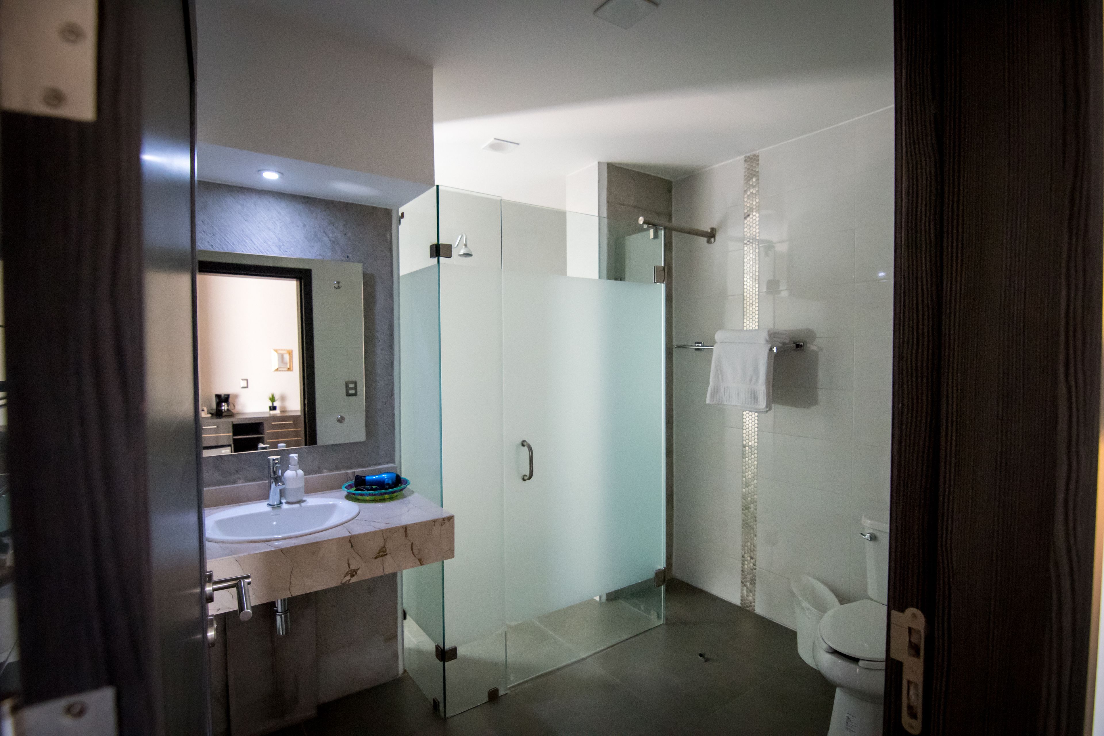 executive suite, 1 king bed | bathroom | shower, free toiletries, hair dryer, towels