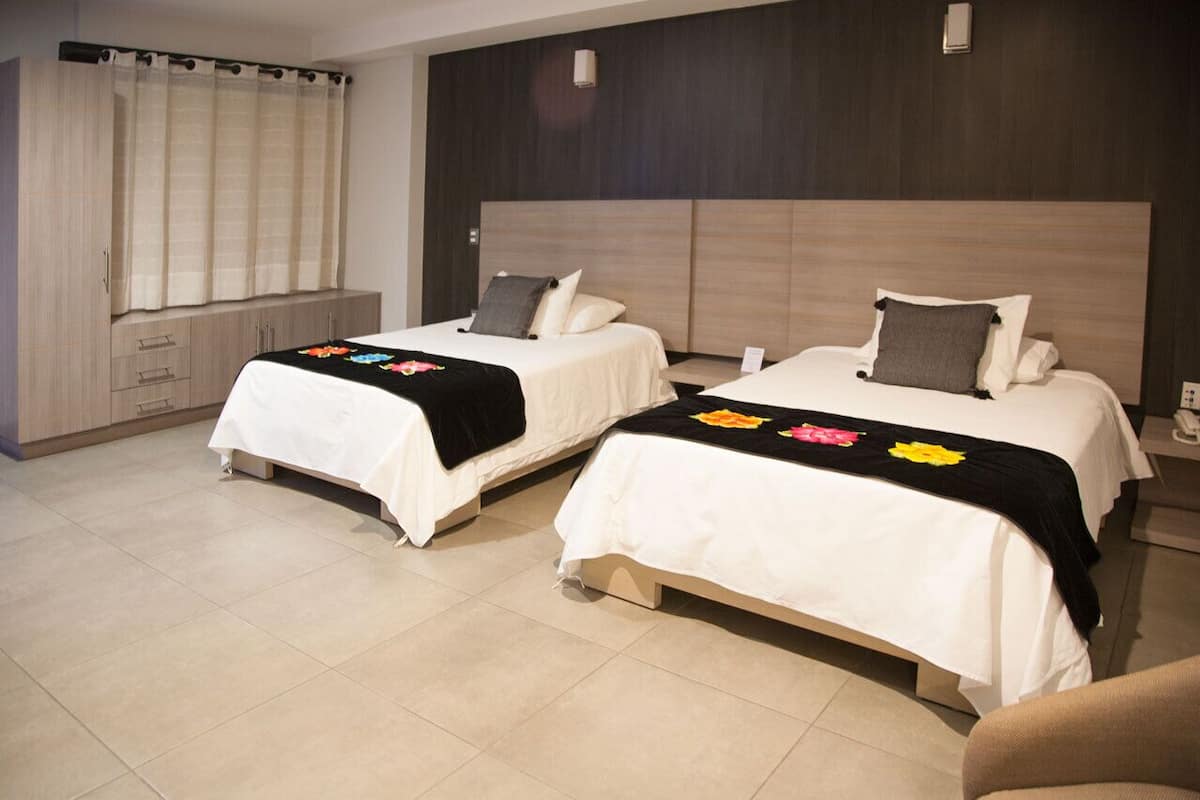 junior suite, 2 double beds | in-room safe, individually decorated, individually furnished