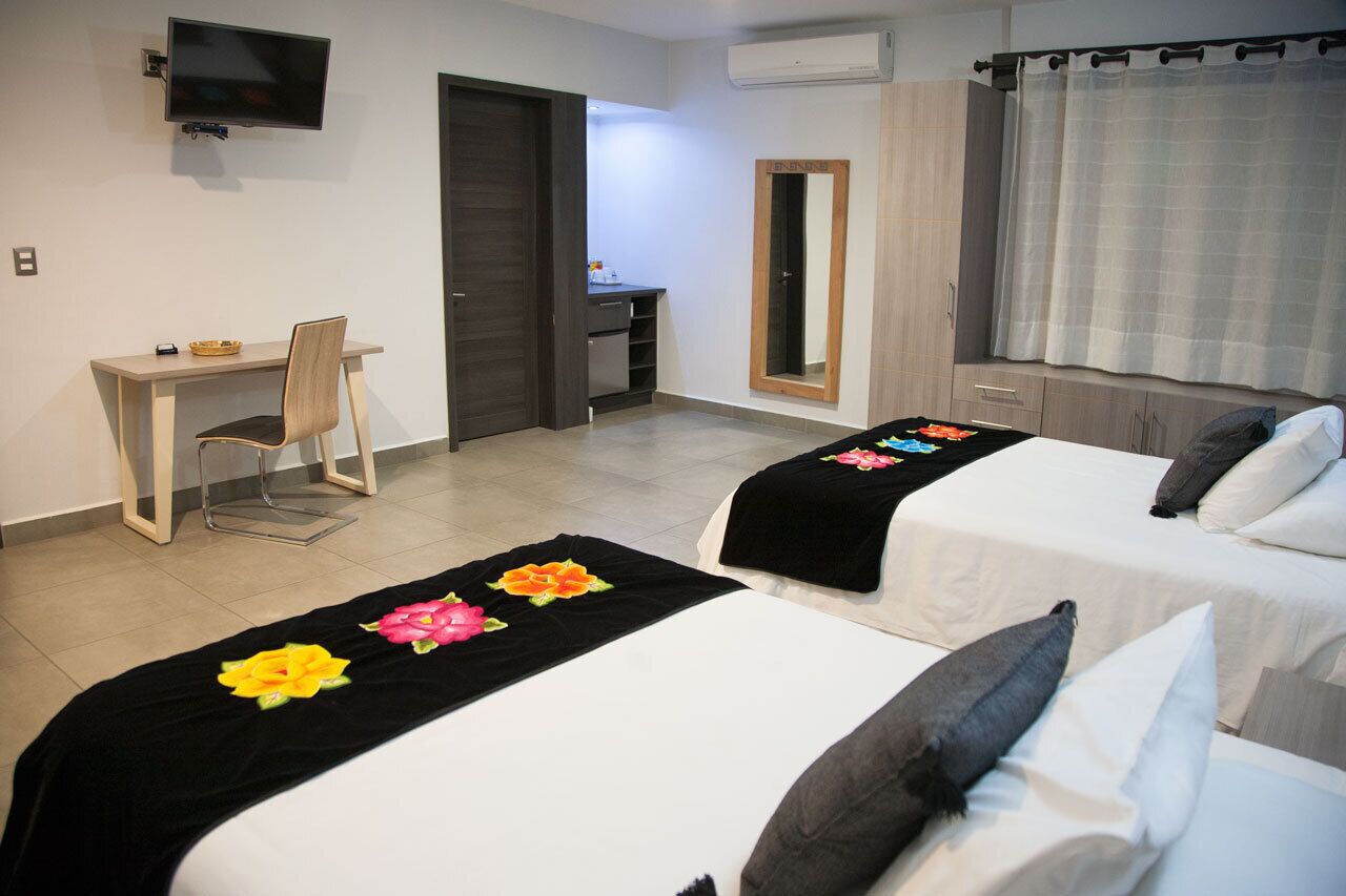 junior suite, 2 double beds | in-room safe, individually decorated, individually furnished