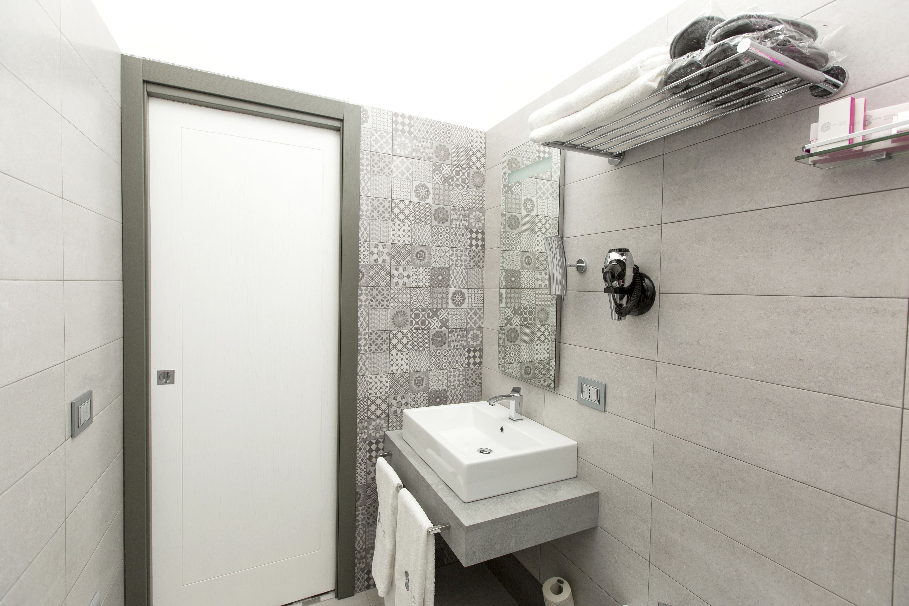 free toiletries, hair dryer, slippers, bidet