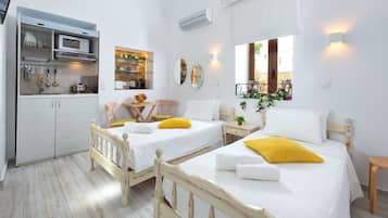 Studio (Citrin) | Premium bedding, memory foam beds, in-room safe, blackout drapes