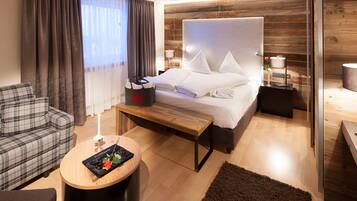 Premium bedding, down duvets, in-room safe, desk