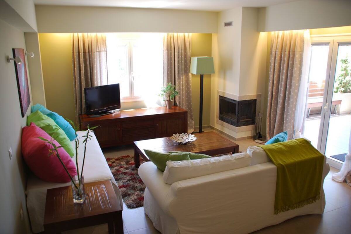 Family Apartment, 1 Bedroom | Living area | LCD TV, fireplace, DVD player