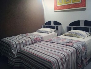 Twin Room | Minibar, iron/ironing board, free WiFi