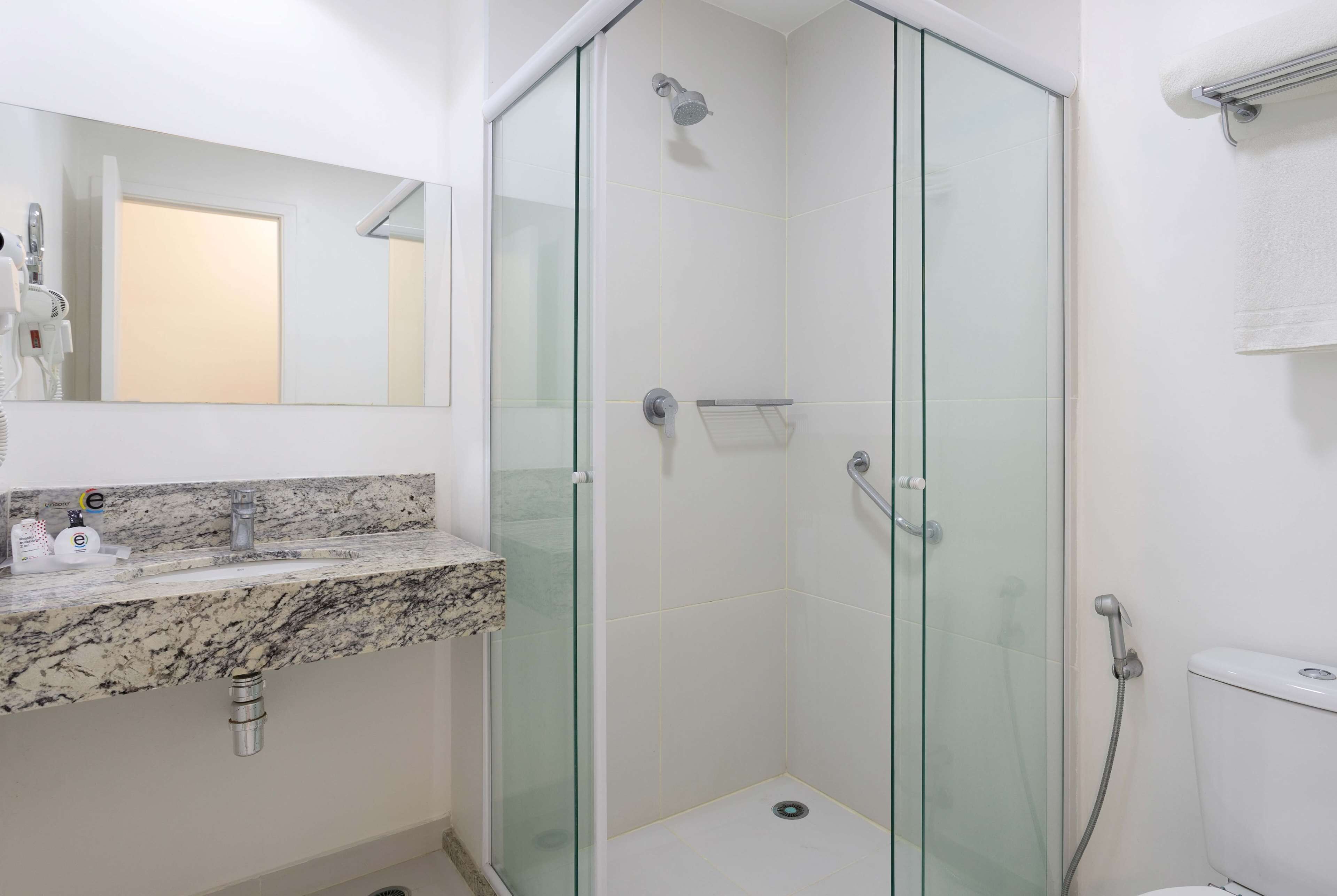 shower, free toiletries, hair dryer, towels