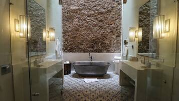 Grand Suite, 1 King Bed | Bathroom | Shower, rainfall showerhead, free toiletries, hair dryer