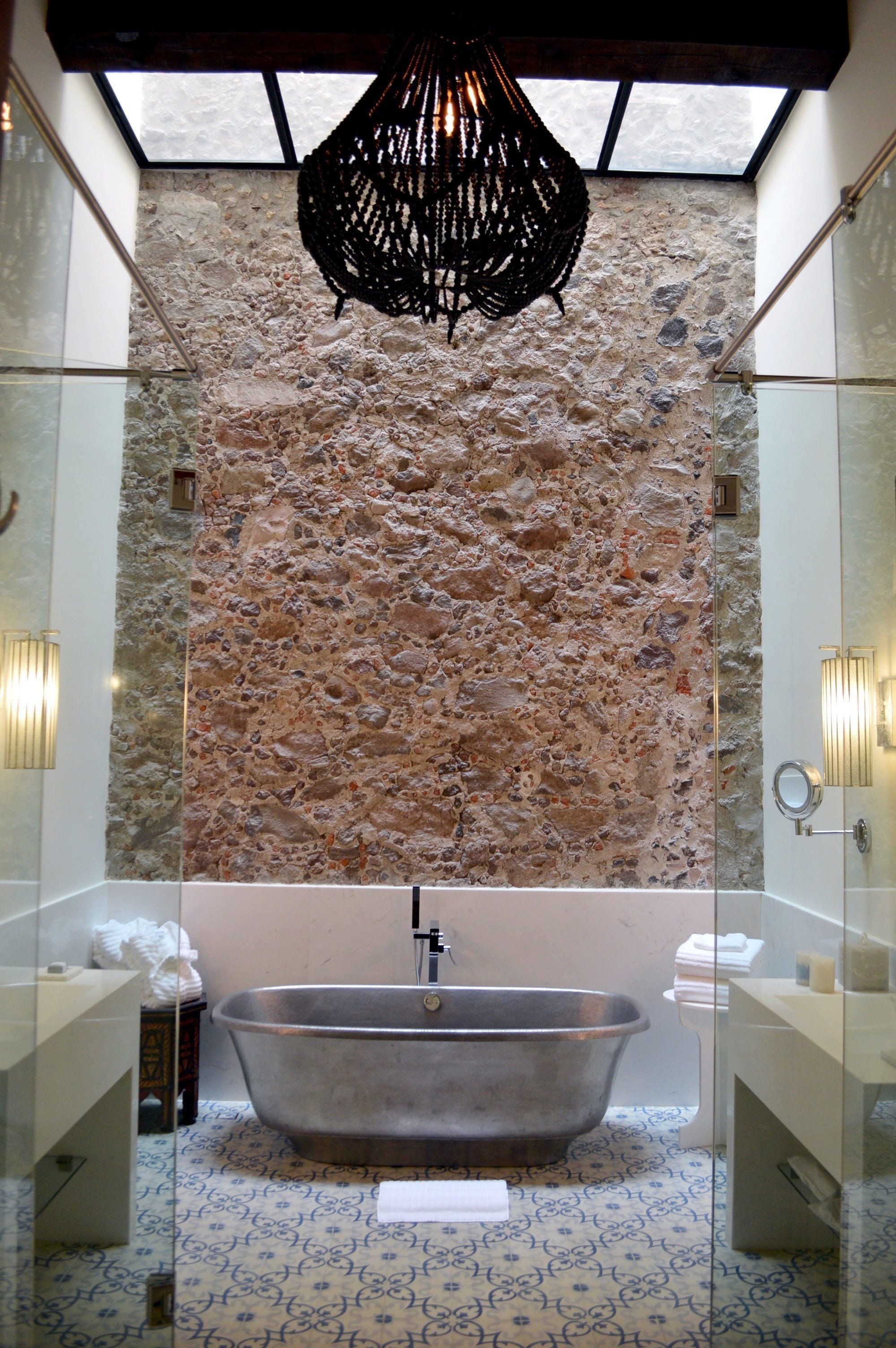 grand suite, 1 king bed | bathroom | shower, rainfall showerhead, free toiletries, hair dryer