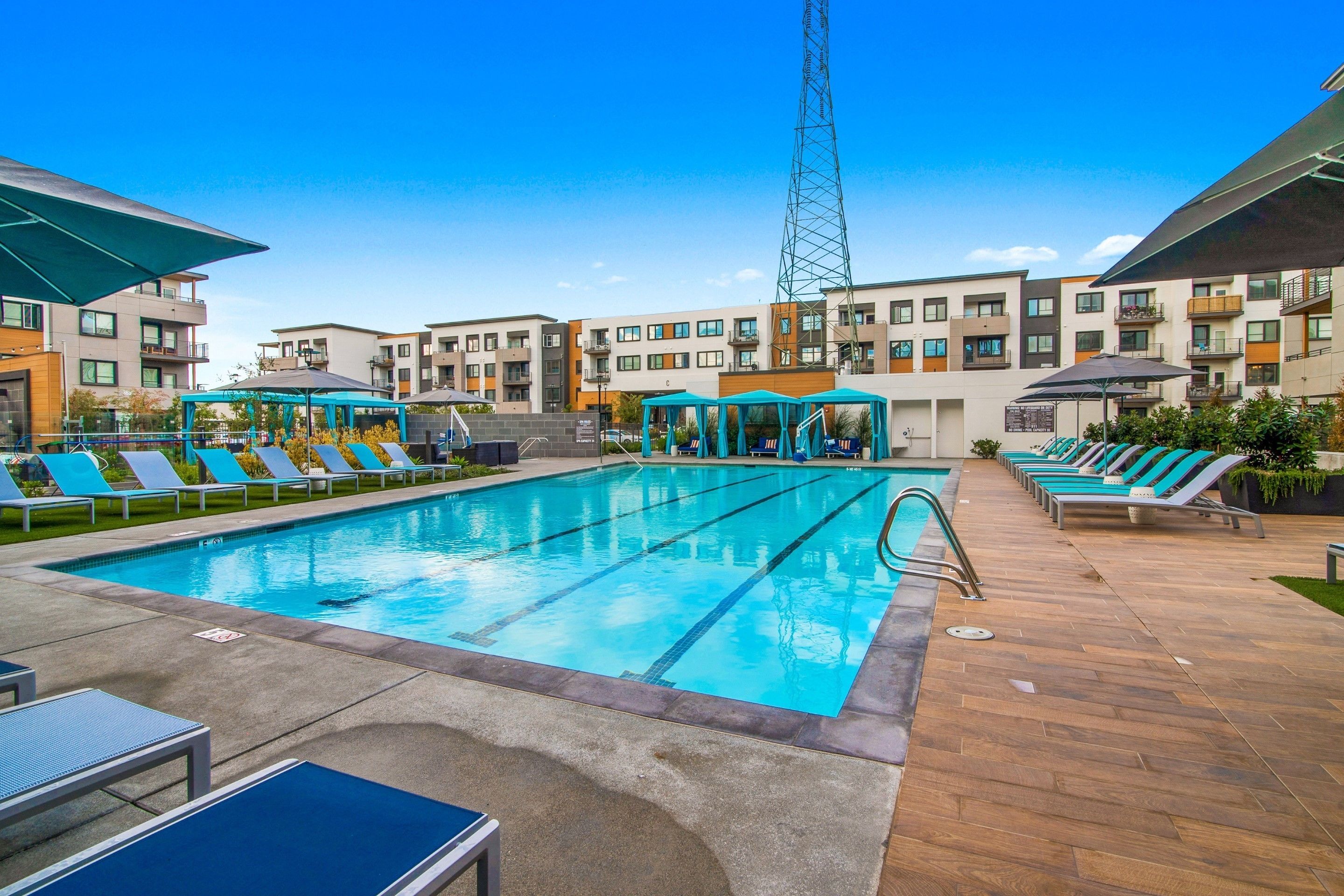 Outdoor pool, a heated pool, open 9:00 AM to 10:00 PM, pool umbrellas