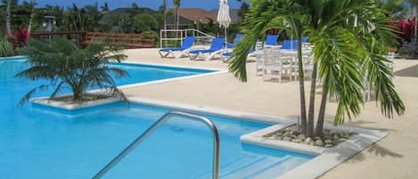 Outdoor pool, pool umbrellas, pool loungers